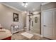 Modern bathroom showcasing a glass-enclosed shower, neutral tile, and stylish vanity at 2767 Lees Landing Circle, Conway, SC 29526