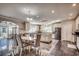 Spacious kitchen with island, stainless appliances, granite counters, and seamless flow to dining area at 2767 Lees Landing Circle, Conway, SC 29526