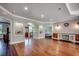 Bright, open living room with hardwood floors, decorative niches, and entry views at 2767 Lees Landing Circle, Conway, SC 29526