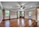 Spacious living room featuring hardwood floors, recessed lighting, and natural light from the windows at 2767 Lees Landing Circle, Conway, SC 29526