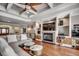 Comfortable living room with coffered ceiling, fireplace, and hardwood flooring at 2767 Lees Landing Circle, Conway, SC 29526