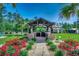 Inviting outdoor kitchen with built-in grill, stone accents, and covered pergola, perfect for entertaining at 2767 Lees Landing Circle, Conway, SC 29526