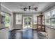 Sunroom with tile floors, glass door, and a view of the backyard at 2767 Lees Landing Circle, Conway, SC 29526
