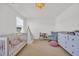 Bright Bedroom with a crib, tent, a chair, and a dresser creating a cozy and inviting space at 302 Portofino Dr., Myrtle Beach, SC 29579