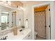 Chic bathroom featuring dual sinks, decorative mirror, and mosaic tiles for a spa-like experience at 304 San Martin Ct., Longs, SC 29568