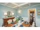 Elegant dining room with coffered ceilings, a chandelier, and a beautifully set table with seating for six at 304 San Martin Ct., Longs, SC 29568