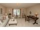 Bright living room with plush seating, elegant decor, and neutral colors creating a welcoming and stylish atmosphere at 304 San Martin Ct., Longs, SC 29568