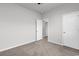 Comfortable carpeted bedroom features a neutral color scheme, offering a blank slate for personalization at 3119 Hannon Dr., Myrtle Beach, SC 29579