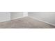 An inviting carpeted room provides an open space, ready for a bedroom or flexible living area at 3119 Hannon Dr., Myrtle Beach, SC 29579