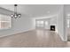 Open living room with neutral tones, fireplace, and lots of natural light at 3119 Hannon Dr., Myrtle Beach, SC 29579