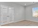 Inviting room featuring wood floors, neutral walls, glass paneled doors and a window with blinds at 3119 Hannon Dr., Myrtle Beach, SC 29579
