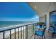 Relaxing balcony with seating and a stunning view of the beach and ocean at 3601 S Ocean Blvd. # 8-C, North Myrtle Beach, SC 29582