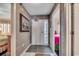 Inviting entryway featuring neutral walls, artwork and view into rooms on either side at 3601 S Ocean Blvd. # 8-C, North Myrtle Beach, SC 29582