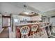 Well-equipped kitchen featuring ample counter space and bar seating with an adjacent entry at 3601 S Ocean Blvd. # 8-C, North Myrtle Beach, SC 29582