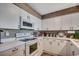 Efficient kitchen featuring white appliances, ample cabinet space, and a functional layout for easy meal preparation at 3601 S Ocean Blvd. # 8-C, North Myrtle Beach, SC 29582