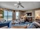 Cozy living room featuring a ocean view balcony, comfortable seating and coastal accents at 3601 S Ocean Blvd. # 8-C, North Myrtle Beach, SC 29582