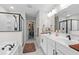 Spa-like bathroom with double vanity, a soaking tub, walk-in shower, and walk-in closet at 370 Foxtail Dr., Longs, SC 29568