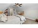 Carpeted bedroom with ceiling fan, closet access, and traditional furnishings at 370 Foxtail Dr., Longs, SC 29568