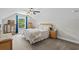 Spacious bedroom with neutral carpet, ceiling fan, and natural light from the window at 370 Foxtail Dr., Longs, SC 29568