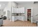 Butler's pantry features generous cabinet space, granite countertop and open storage at 370 Foxtail Dr., Longs, SC 29568