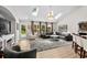 Comfortable living space with skylights, hardwood floors, and views of the backyard at 370 Foxtail Dr., Longs, SC 29568