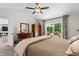 Comfortable main bedroom featuring vaulted ceiling, backyard access, and natural light at 370 Foxtail Dr., Longs, SC 29568
