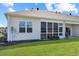 The enclosed sunroom overlooks the well-maintained backyard at 3766 Bells Lake Circle # 3766, Longs, SC 29568