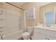Clean bathroom with a single sink vanity, white cabinets, and a standard bathtub and shower combination at 3766 Bells Lake Circle # 3766, Longs, SC 29568