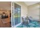 Enclosed patio area offering a relaxing spot to enjoy outdoor living with views of a lush green lawn at 3766 Bells Lake Circle # 3766, Longs, SC 29568