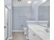 Bathroom with a single sink vanity, a large mirror, and a glass-enclosed shower at 389 Barton Loop, Myrtle Beach, SC 29579