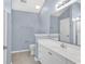 Bathroom featuring a single sink vanity, a large mirror, and a glass-enclosed shower at 389 Barton Loop, Myrtle Beach, SC 29579