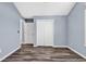 Simple bedroom with wood-look floors, a closet and neutral walls at 389 Barton Loop, Myrtle Beach, SC 29579