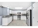 Modern kitchen featuring white cabinets and stainless steel appliances at 389 Barton Loop, Myrtle Beach, SC 29579
