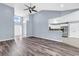 Open-concept living area with high ceilings and views into the kitchen at 389 Barton Loop, Myrtle Beach, SC 29579
