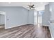 Spacious living room featuring high ceilings, vinyl plank flooring, and a ceiling fan at 389 Barton Loop, Myrtle Beach, SC 29579