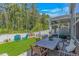 The expansive backyard features a dining area, patio, and play area for  at 396 Emery Oak Dr., Murrells Inlet, SC 29576