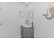 Charming coastal-themed bathroom features a gray vanity and lovely mermaid decor at 396 Emery Oak Dr., Murrells Inlet, SC 29576