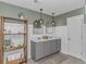 Elegant bathroom featuring double sinks, modern lighting fixtures, and stylish decor at 396 Emery Oak Dr., Murrells Inlet, SC 29576