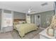 Main bedroom with a king bed, green walls and lots of natural light at 396 Emery Oak Dr., Murrells Inlet, SC 29576