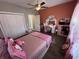 Charming bedroom featuring unique Hello Kitty decor, a cozy bed, and a creative, personalized atmosphere at 4008 Tupelo Ct., Conway, SC 29526