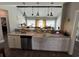 Lovely kitchen with stainless steel appliances, white cabinetry and an open floor plan at 4008 Tupelo Ct., Conway, SC 29526