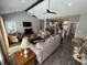 This living room has vaulted ceilings, exposed beams, and an open concept layout at 4008 Tupelo Ct., Conway, SC 29526
