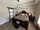 Spacious main bedroom boasts hardwood floors, a ceiling fan, and a ensuite bathroom at 4008 Tupelo Ct., Conway, SC 29526