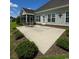 Spacious patio area with outdoor seating, perfect for relaxing and enjoying the backyard and outdoor gatherings at 4008 Tupelo Ct., Conway, SC 29526