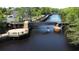 Picturesque waterfront view featuring bridges, docks, and recreational activities like kayaking on the calm river at 4008 Tupelo Ct., Conway, SC 29526