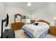 Bright bedroom featuring a dark TV, light wood furniture, and natural light at 404 Windermere Lake Circle, Conway, SC 29526