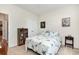 Inviting bedroom with a cozy starfish themed bed, carpet flooring, and bright natural light from the window at 404 Windermere Lake Circle, Conway, SC 29526