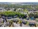 Aerial view of a well maintained community with mature landscaping, ponds, and easy access to nearby businesses at 4276 Santolina Way # A, Murrells Inlet, SC 29576