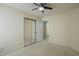 Bedroom featuring a ceiling fan and closet with mirrored doors at 4276 Santolina Way # A, Murrells Inlet, SC 29576