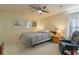 Cozy bedroom featuring soft lighting, comfortable bed, and calming decor at 4276 Santolina Way # A, Murrells Inlet, SC 29576